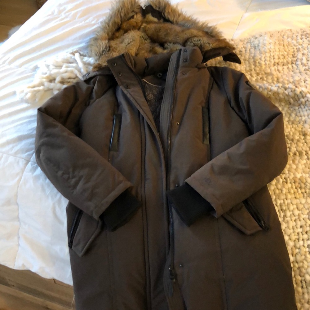 Warm, brand new down jacket, $600 retail price.